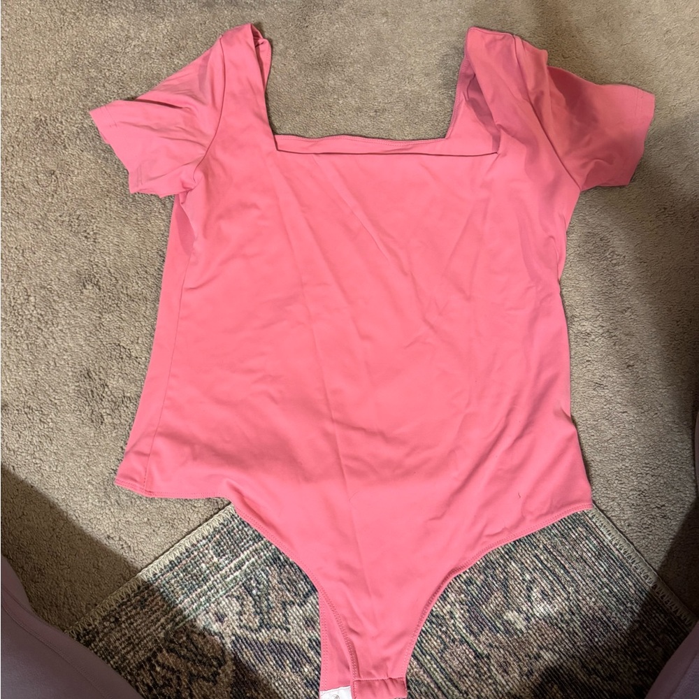 Pink bodysuit